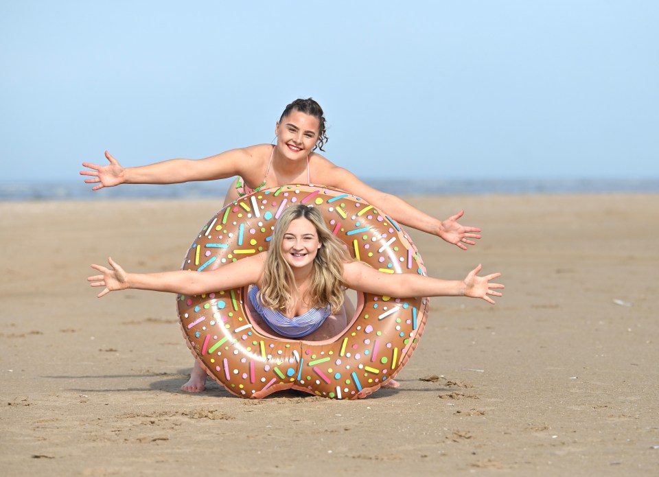 Two women enjoy the warm weather in Lancashire