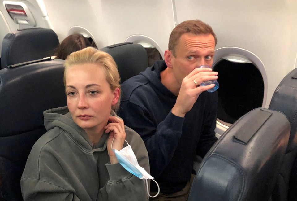 Alexei Navalny and Yulia Navalnaya on a flight from Berlin to Moscow on January 17, 2021