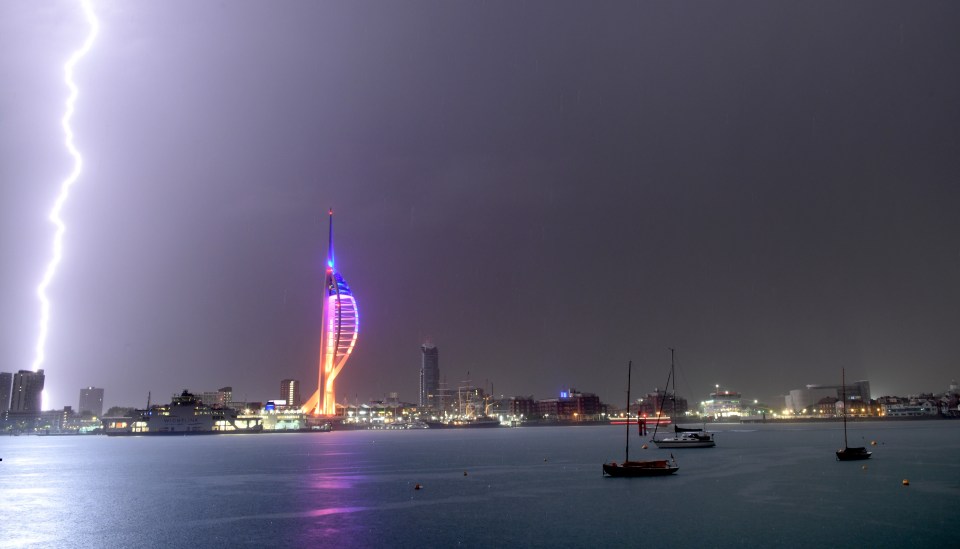 A lightning storm over Portsmouth Harbour and the Spinnaker Tower in Hampshire