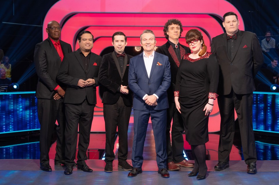 Issa pictured with host Bradley Walsh, Shaun Wallace, Paul Sinha, Darragh Ennis, Jenny Ryan and Mark Labbett