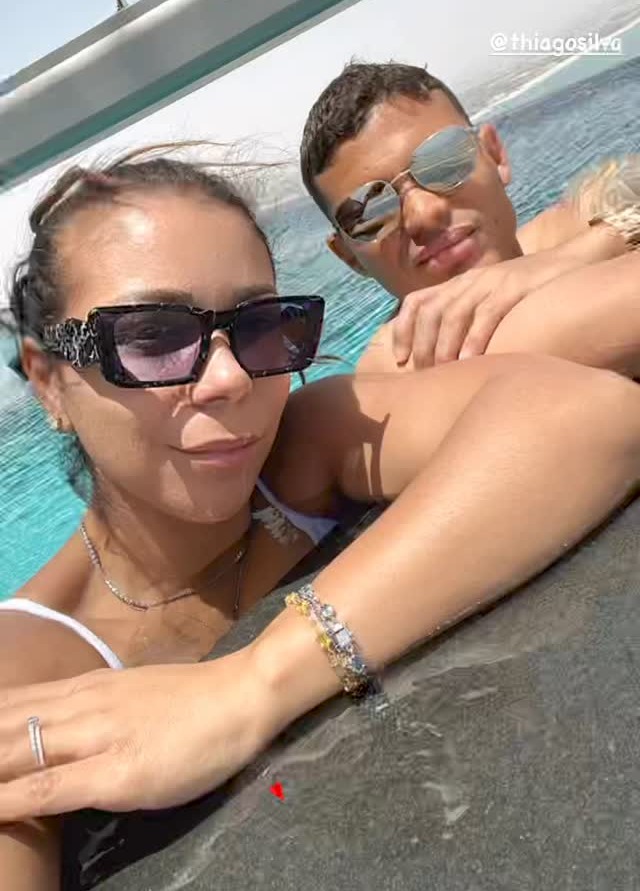 Silva and his wife enjoyed some downtime in the swimming pool