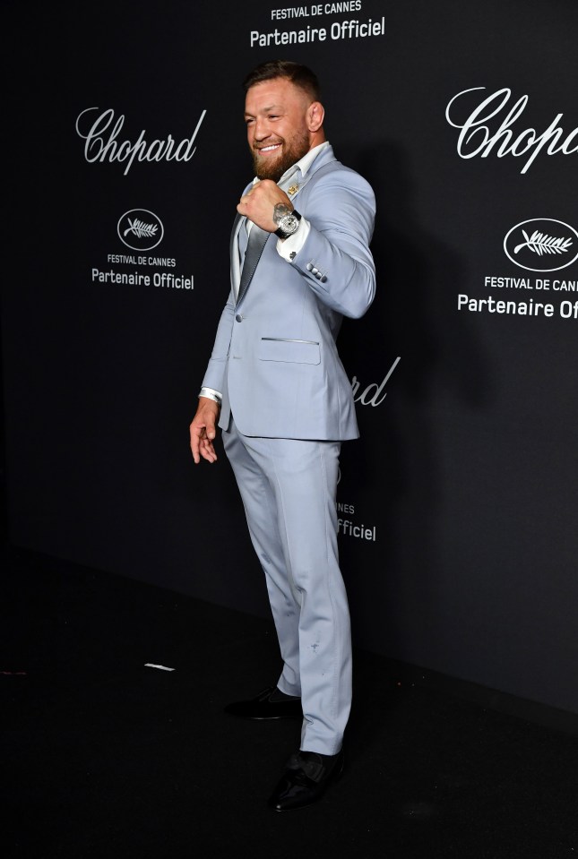 The UFC's poster boy looked dapper in a light blue suit with silver lapels