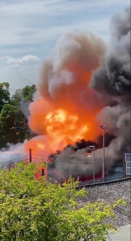 This is the astonishing moment a bus explodes amid a huge fire at a depot in Potters Bar