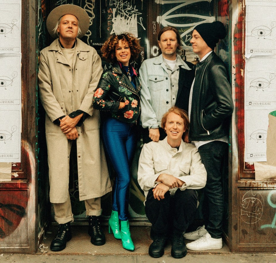 Win Butler with members of band Arcade Fire