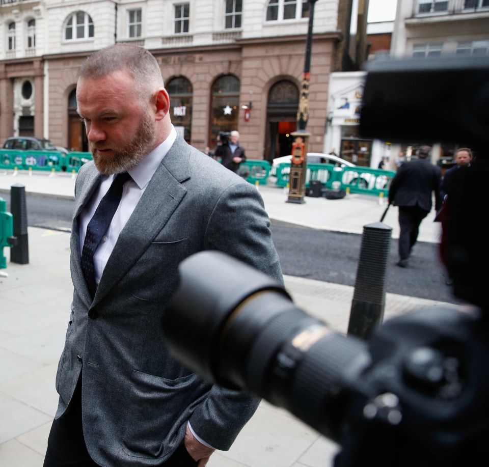 Derby County manager Wayne was surrounded by cameras as he walked into the building with his hands in his pockets