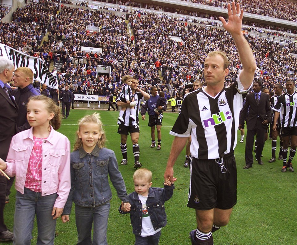 Alan with his three kids while playing for Newcastle in 2002