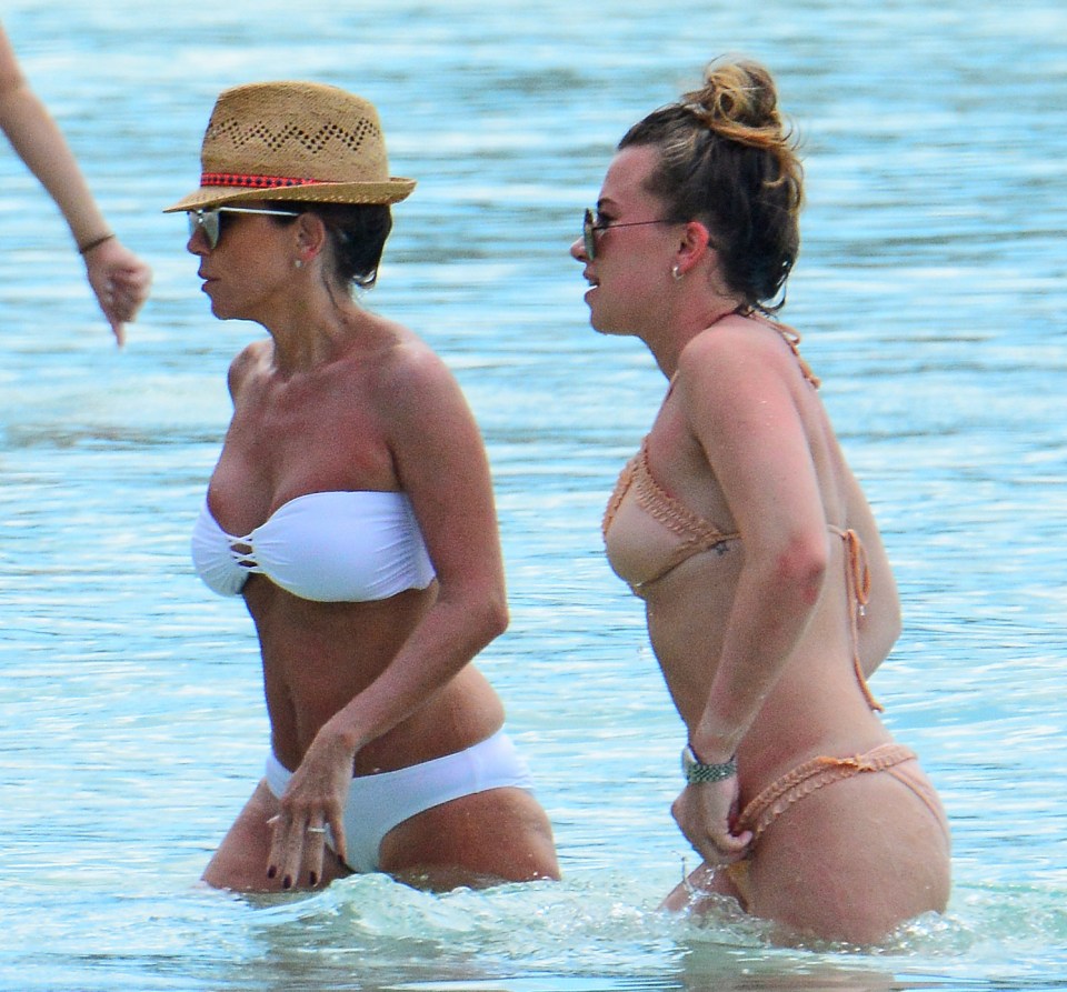 Lainya and Chloe pictured on the beach while on a family holiday in Barbados in 2016