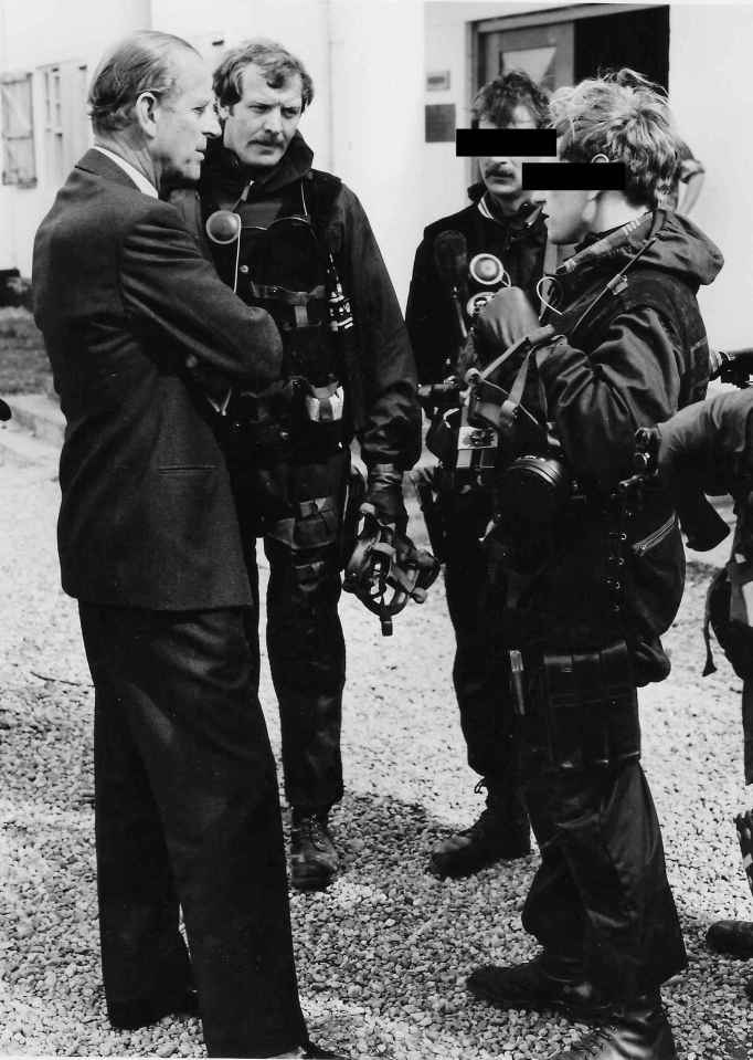 Heroes from the Who Dares Wins regiment speak with Prince Philip, the Duke of Edinburgh