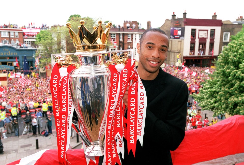 Henry with the Premier League title in 2004