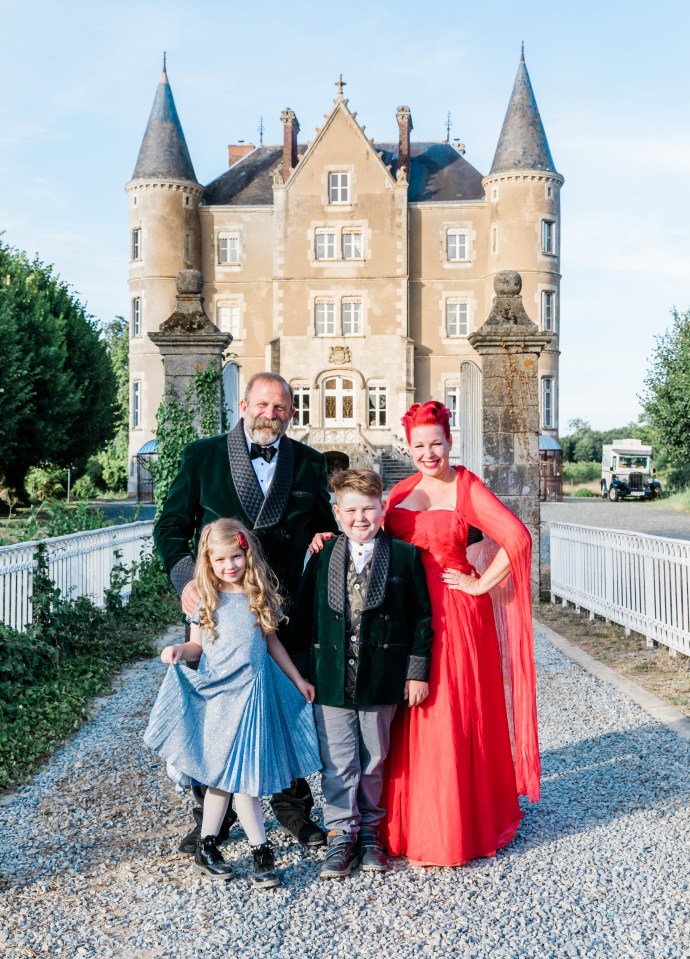 The couple pictured with their kids Arthur and Dorothy