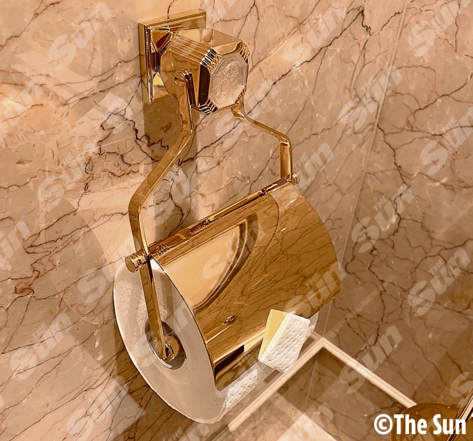 The sickeningly decadent vessel even has gold loo roll holders