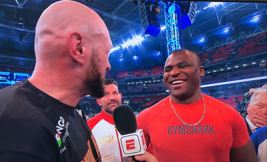 Tyson Fury facing off with Francis Ngannou