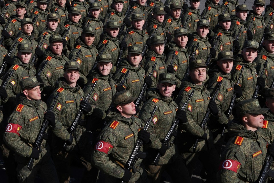 Russian service members take part in a rehearsal for the Victory Day parade