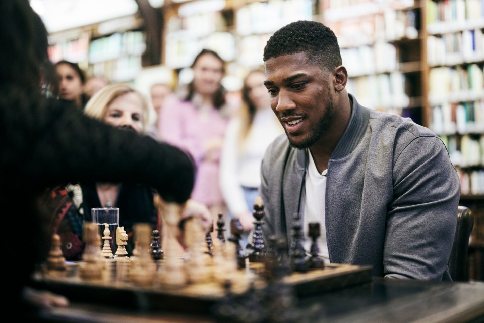 And the former unified heavyweight champion even took on a couple of students in chess