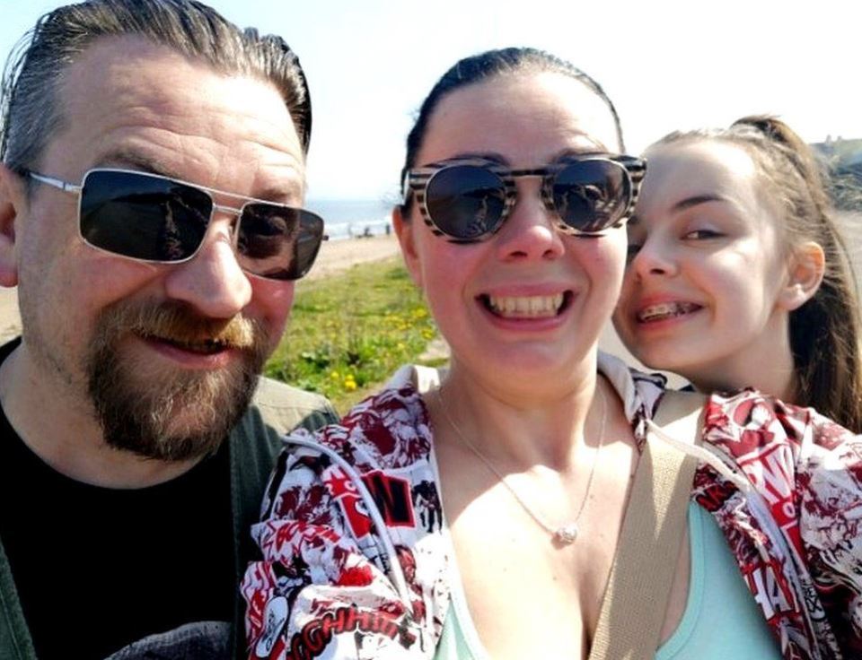 Kimberly Bradley wanted to remember this family day at the beach, so took a selfie with her husband Nathan (left) and daughter Lucy (right)