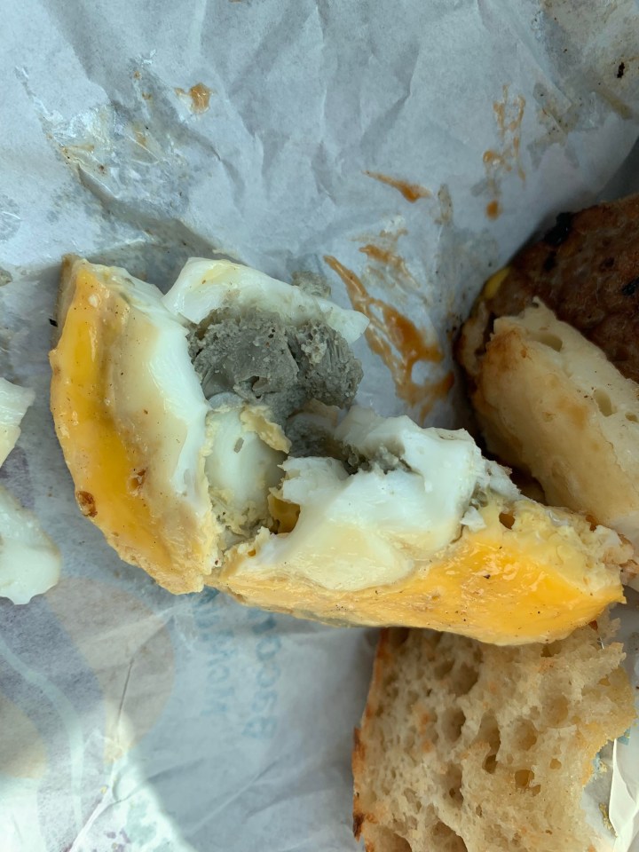 Kym was left horrified after finding a 'mouldy' egg hiding in her McMuffin