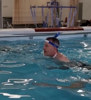 Richard is training for a half iron man, which involves swimming