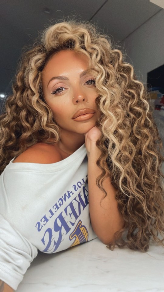 Singer Jesy Nelson told her fans: 'The lashes are back on'