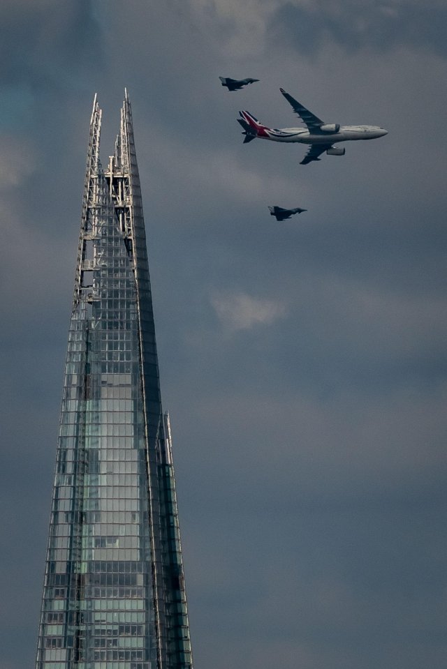 The city momentarily ground to a halt as astonished on-lookers watched the planes pass by