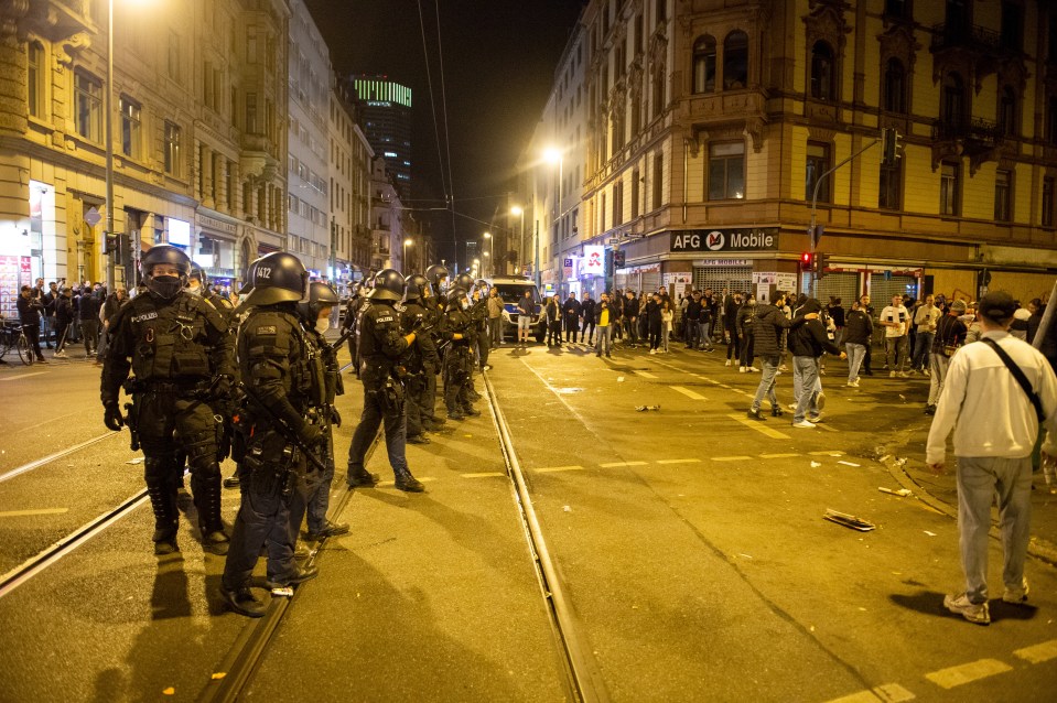 Water cannons were eventually used to disperse the German hooligans