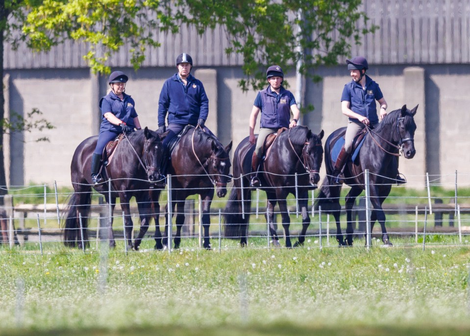 The Duke of York out riding with grooms on the Windsor Estate