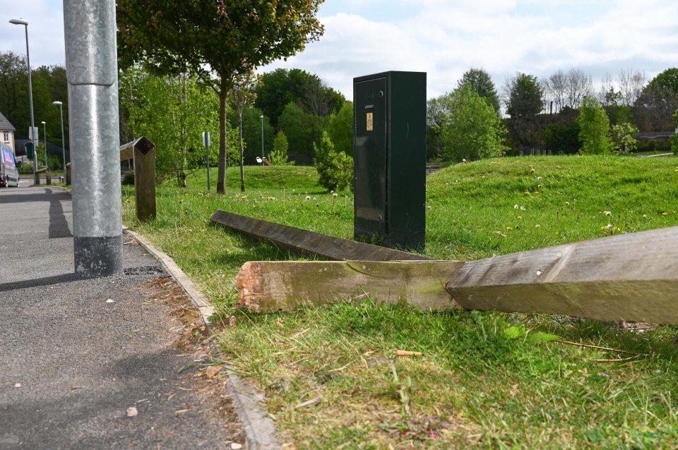 A wooden fence in the development has broken