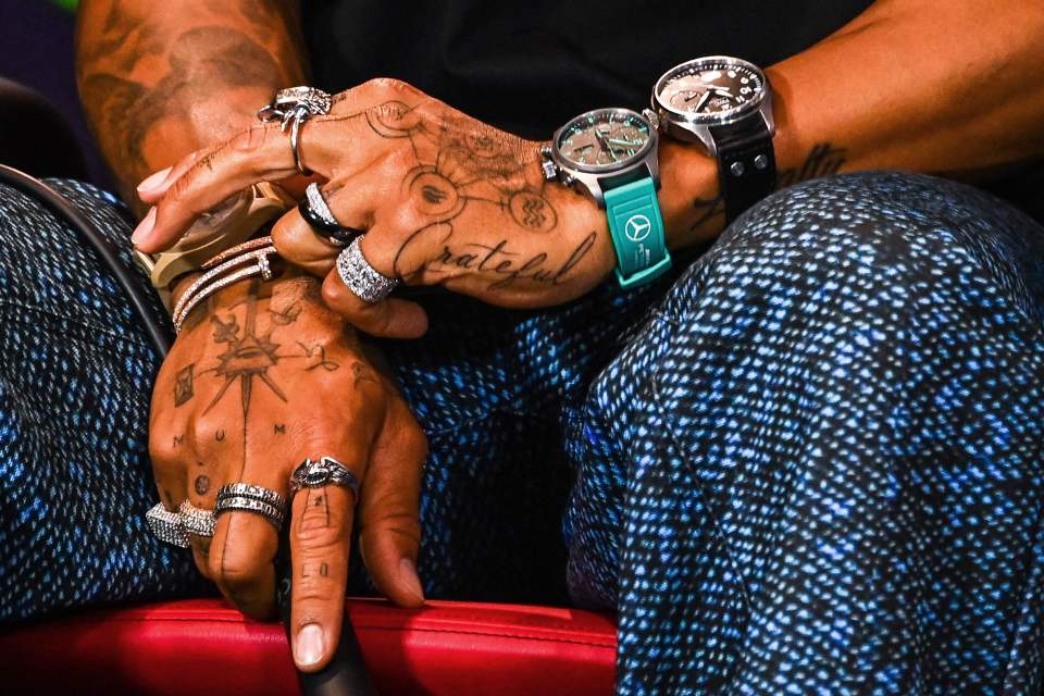 Hamilton wore a ring on each finger and three watches in protest at the FIA's jewellery rule