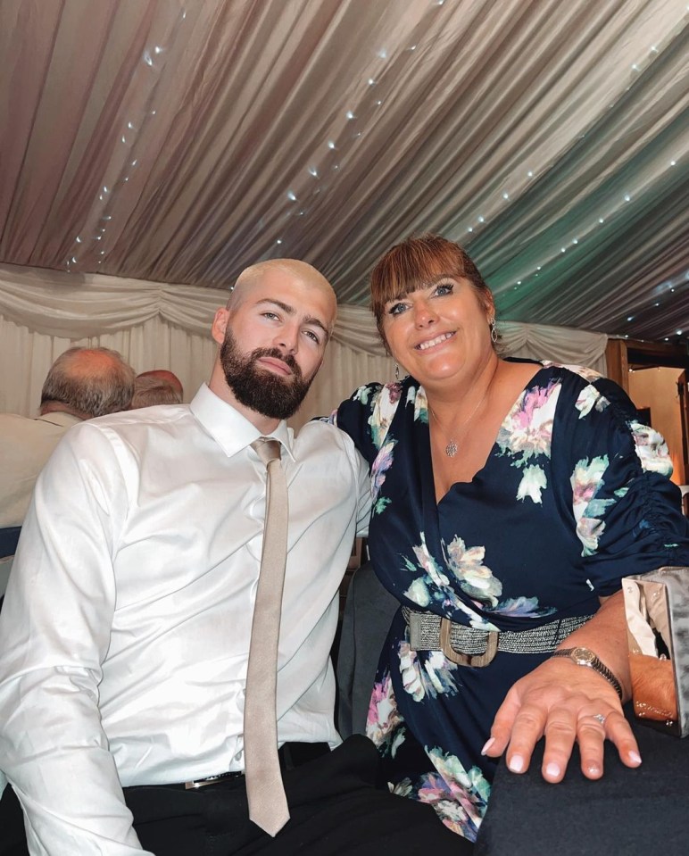 Mum Julie poses with son Tom Jr