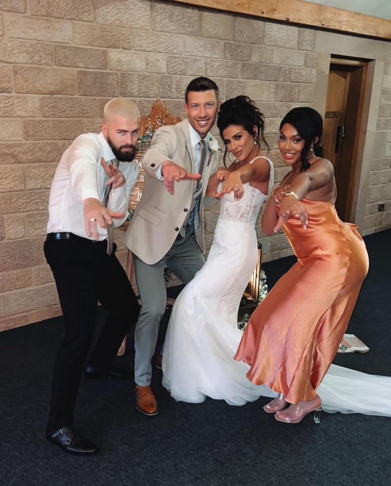 Tom and Lee looked so dapper alongside the bride as they posed for pictures