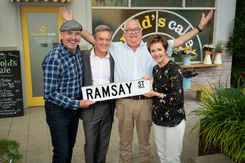 Alan Fletcher, Stefan Dennis, Ian Smith and Jackie Woodburne pose with a Ramsay St sign ahead of the final episode