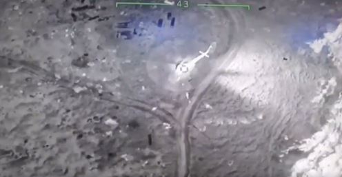 Footage begins by showing a drone filming a Russian helicopter from above