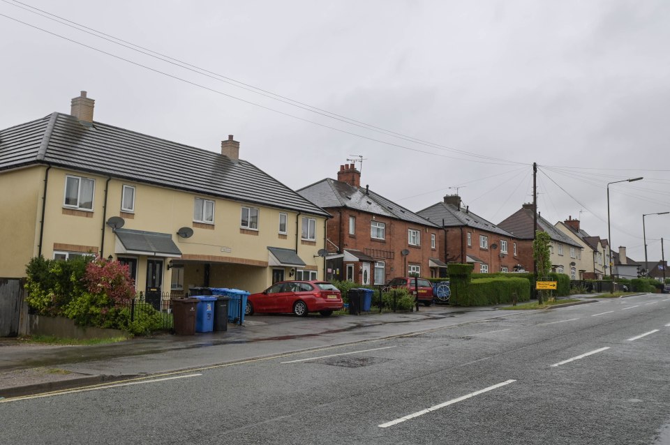 An arched building (left) now stands where the Philpott's family house once stood before it was bulldozed