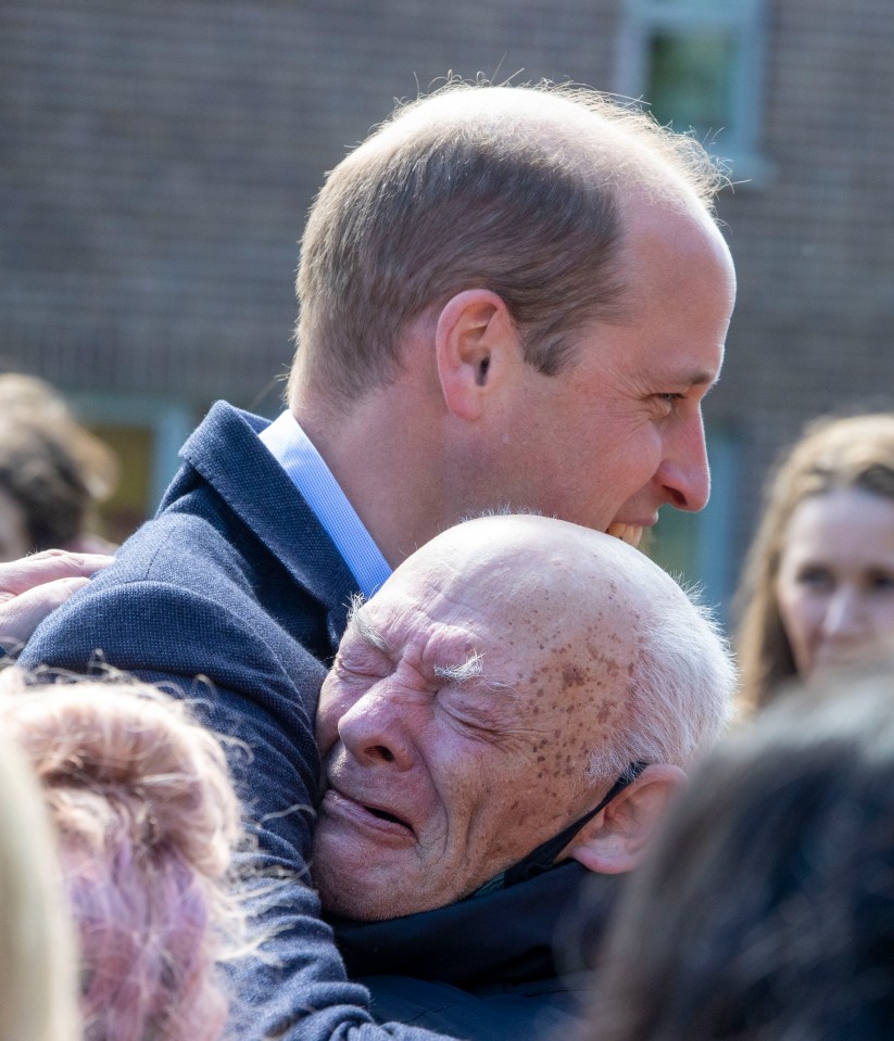 Prince William goes 'off-piste' and hugs an emotional fan