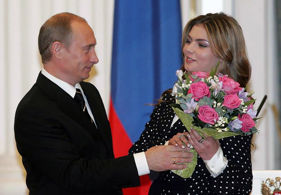 Alina Kabaeva and Vladimir Putin at an event in the Kremlin