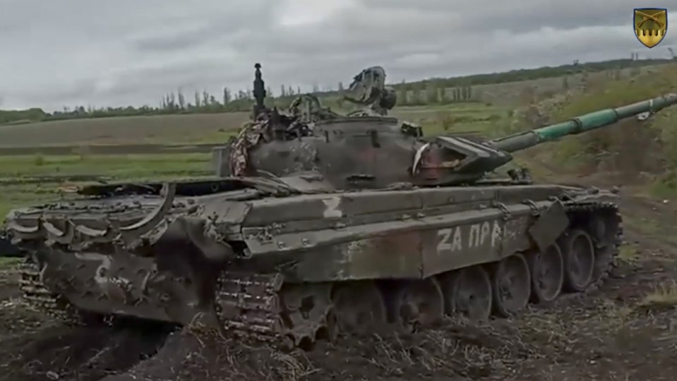 The video also shows an abandoned Russian tank