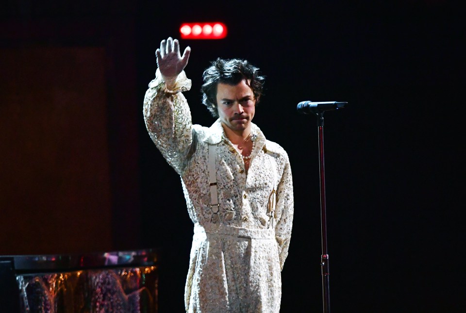 Harry has a love of lace and frothy shirt cuffs...