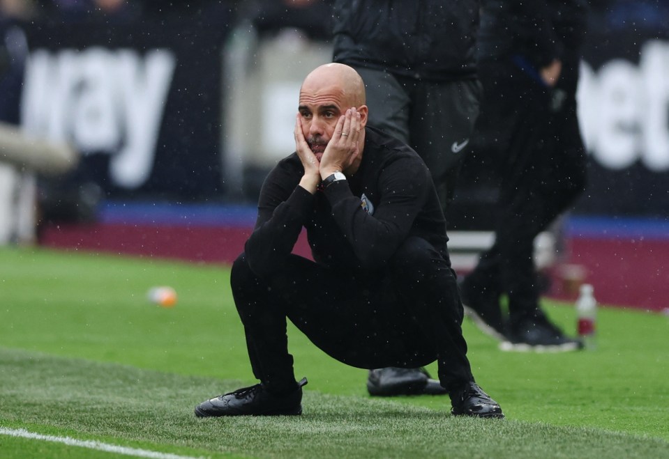 Guardiola looks on in despair as his team went 2-0 down in the first-half