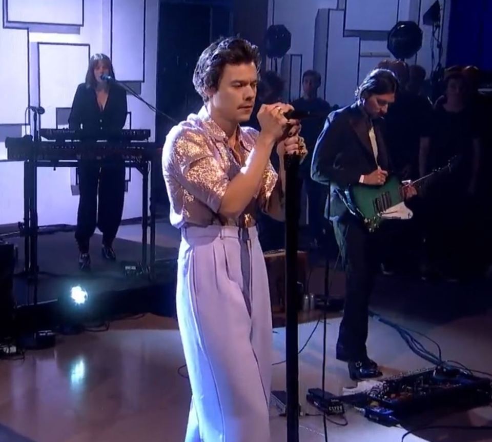 Harry looked like a Rebel Rebel in his sailor-style trousers and braces outfit