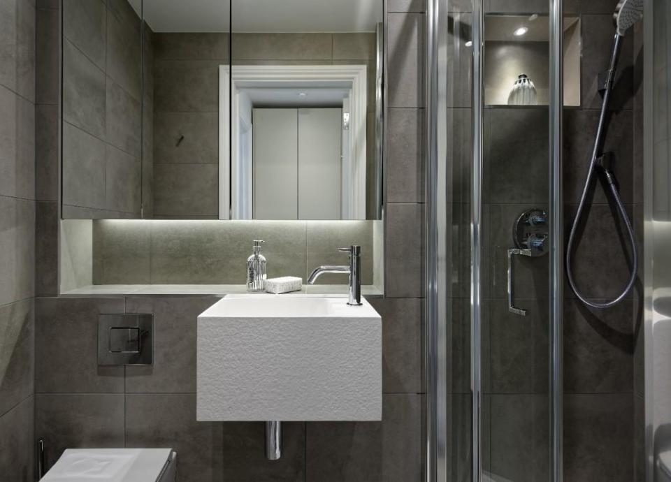 The shower has a clean and sleek modern look