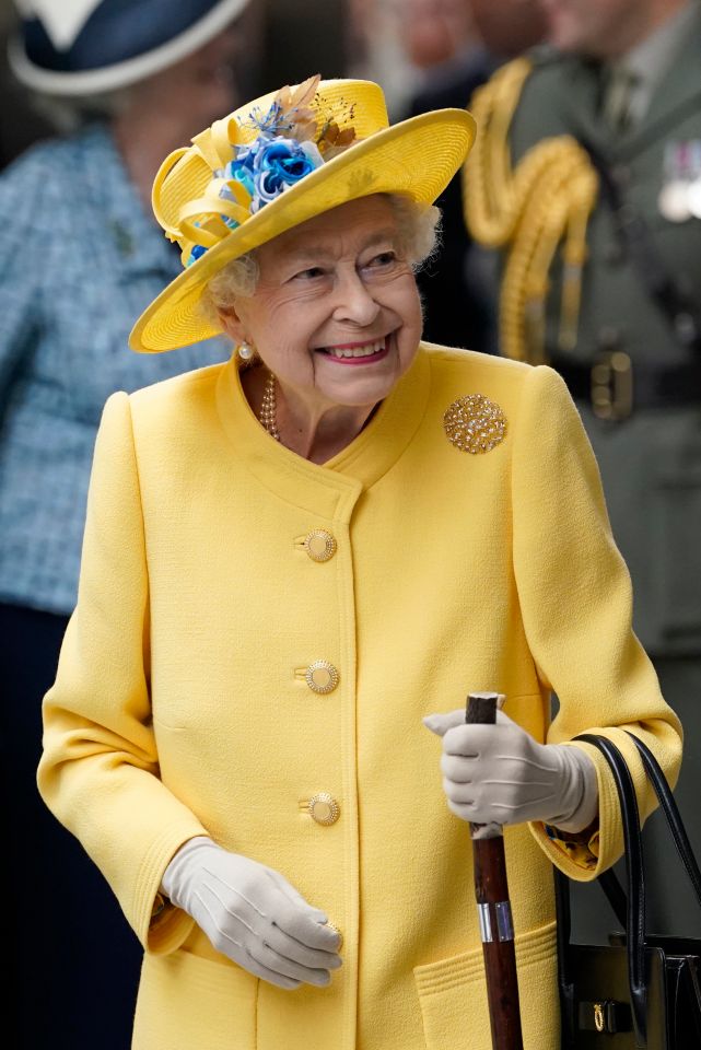 She carried a walking aid and wore bright springtime yellow as she marked the completion of the Crossrail project with a special trip to London