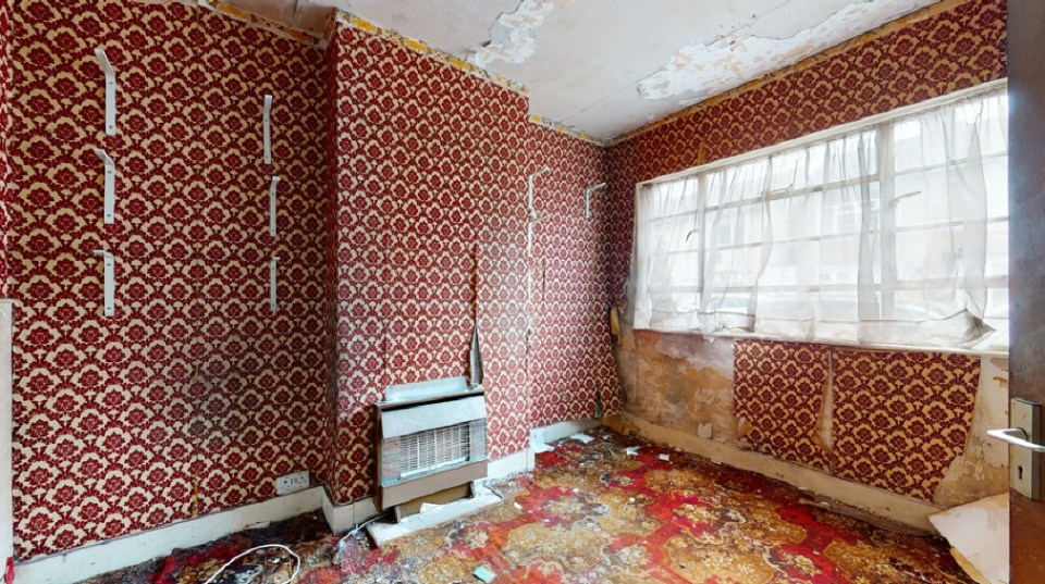 Carpets are in a poor state, while wallpaper is peeling away