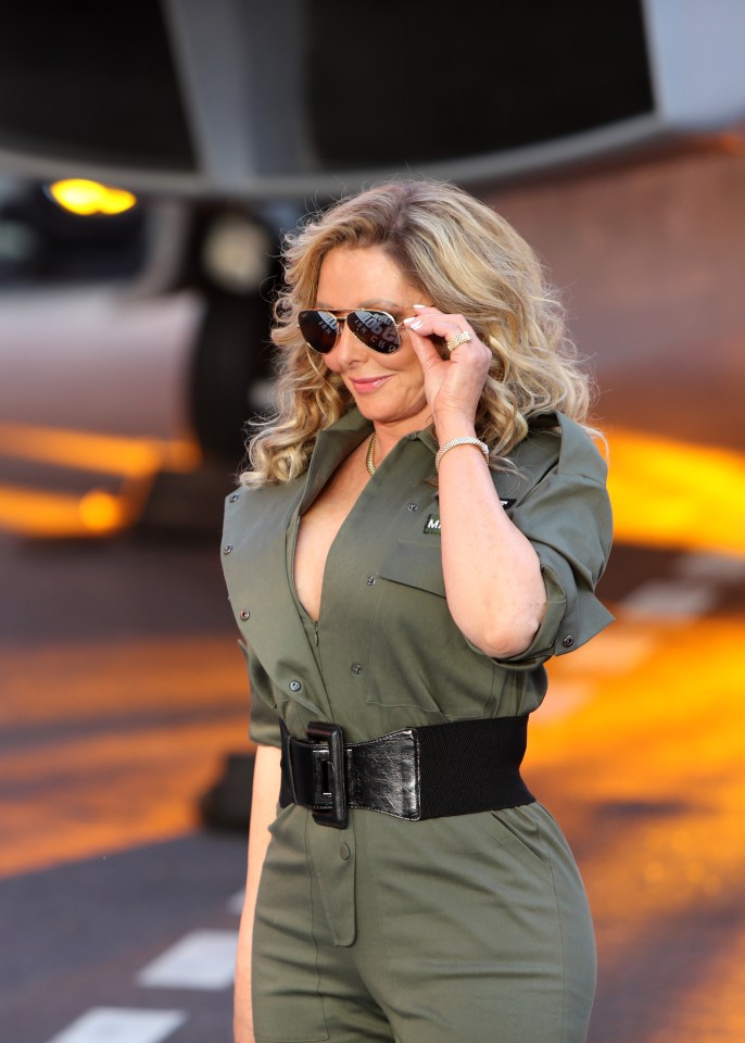 She understood the assignment - dressing in a tight flight suit and sporting Aviator shades