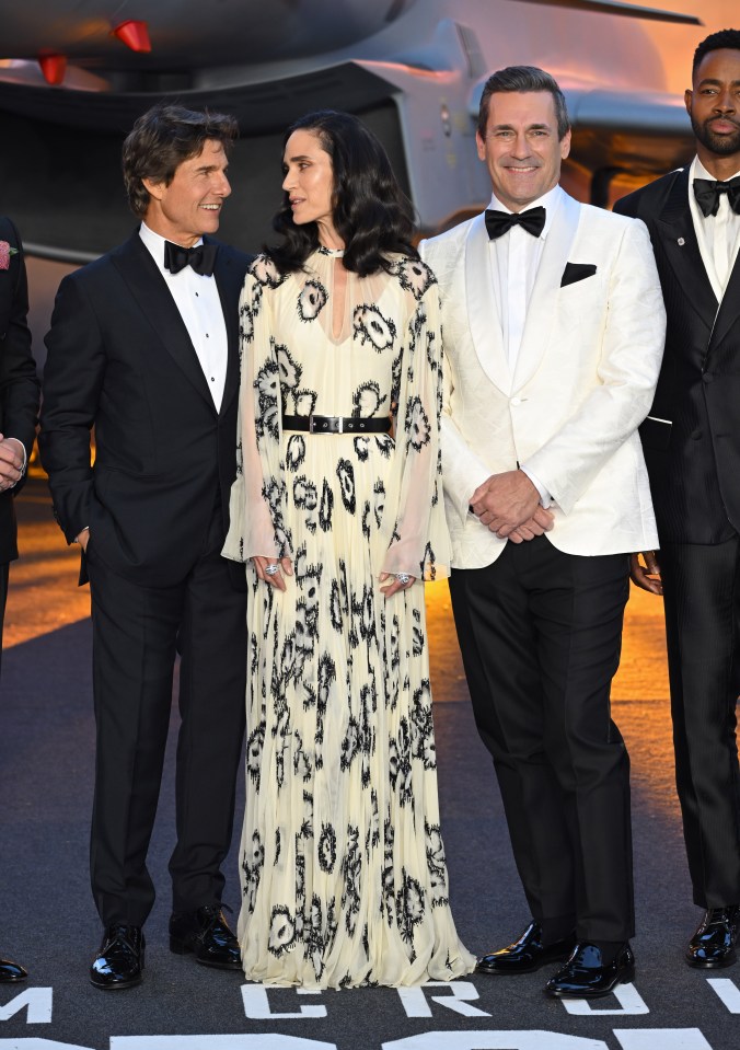 Star of Top Gun Tom Cruise posed alongside co-stars Jennifer Connelly and Jon Hamm attend the Royal Performance of “Top Gun: Maverick” at Leicester Square