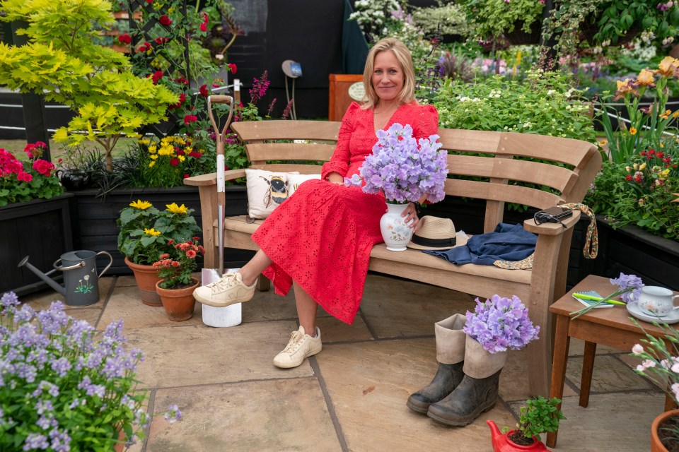 Sophie Raworth sits on Peter Seabrook Memorial bench at the Chelsea Flower Shower