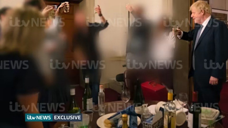 Mr Johnson raises a glass during the national lockdown in November 2020