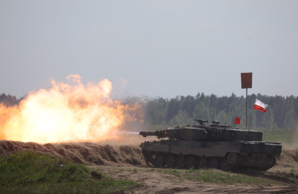 A Polish Leopard 2PL tank fires during Defender Europe 2022 military exercise of NATO troops including French, American, and Polish troops - the PM wants to send Ukraine more help