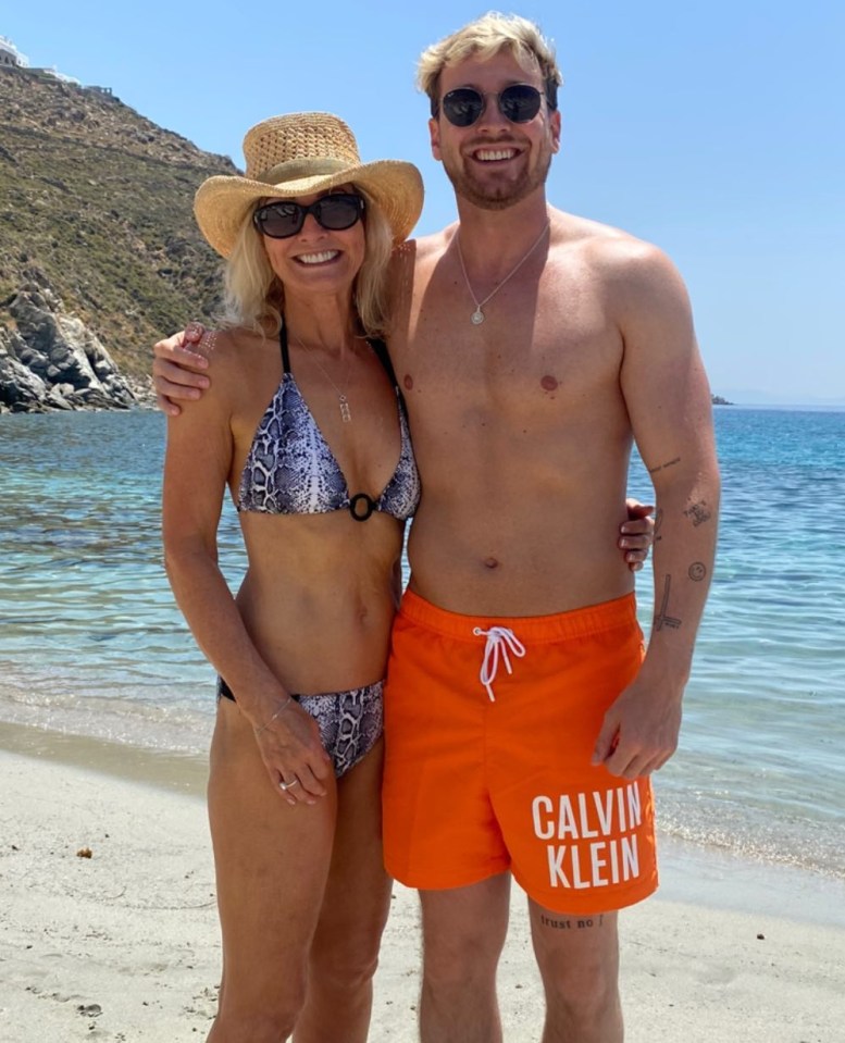 Sam Thompson posed with his rarely-seen mum on the beach