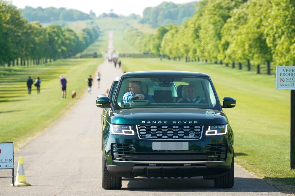 Prince Andrew pictured driving through Windsor in his new Range Rover