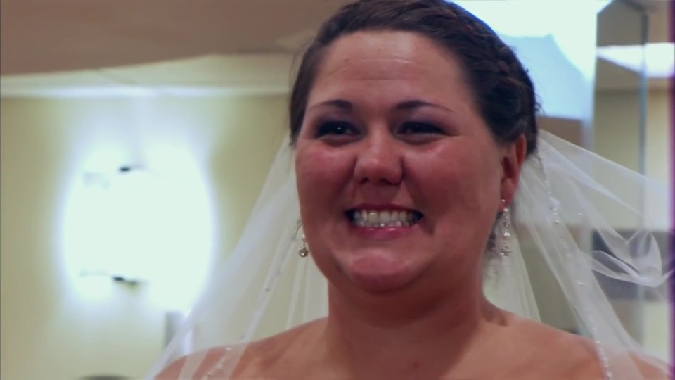 Later she was all smiles as she chose the dress she'll walk down the aisle in