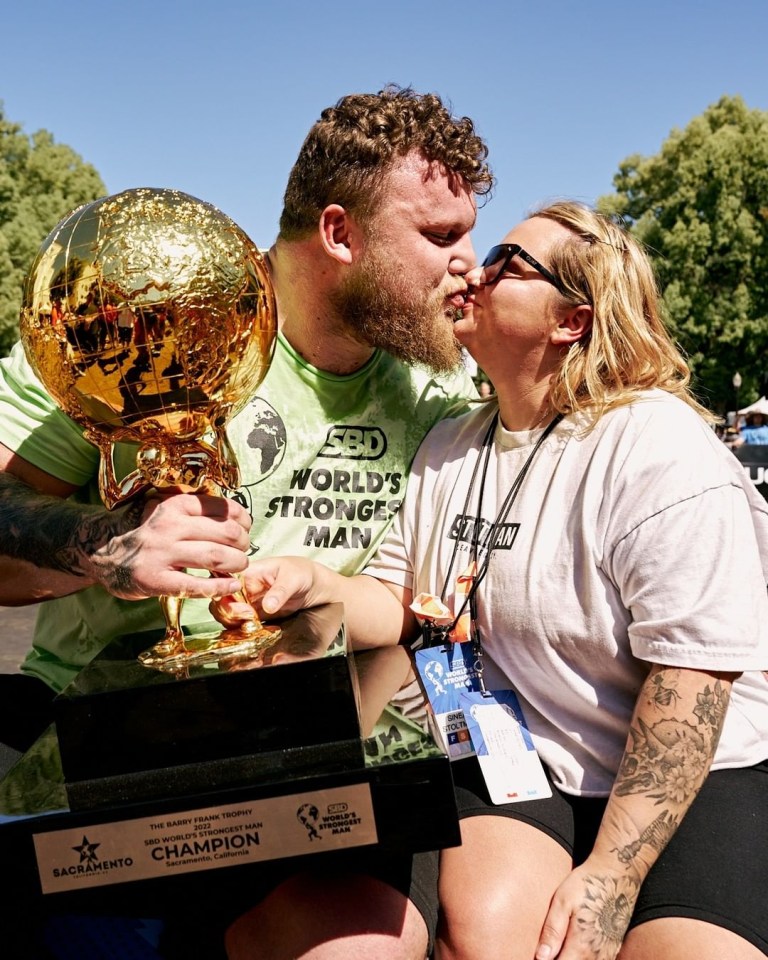 Stoltman celebrates his win in Sacramento, California, with wife Sinead